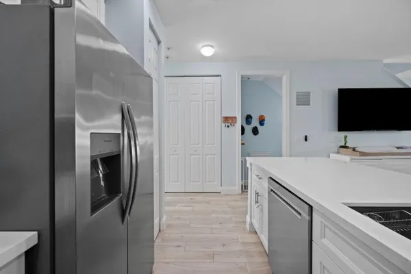 a view of a kitchen with a sink