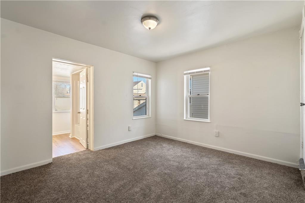 481 Union Street Verona, PA 15147 - Photo 12 of 25 an empty room with windows and closet
