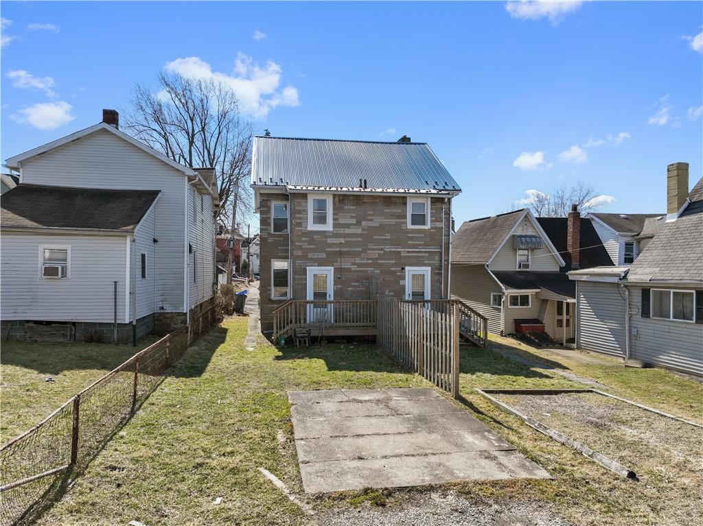 481 Union Street Verona, PA 15147 - Photo 22 of 25 a front view of a house with garden
