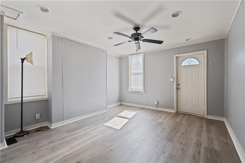 481 Union Street Verona, PA 15147 - Photo 3 of 25 wooden floor in an empty room with a window
