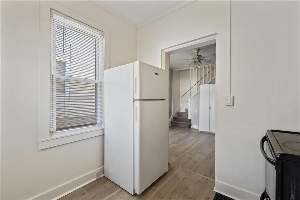 481 Union Street Verona, PA 15147 - Photo 10 of 25 a white refrigerator freezer and a dishwasher in a kitchen