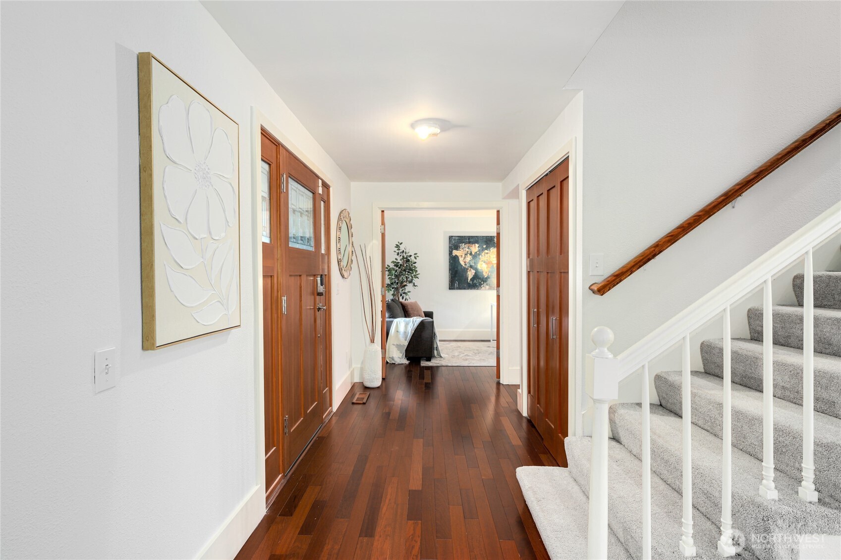 6116 152nd Avenue Northeast Redmond, WA 98052 - Photo 17 of 34 a view of a hallway with wooden floor and windows
