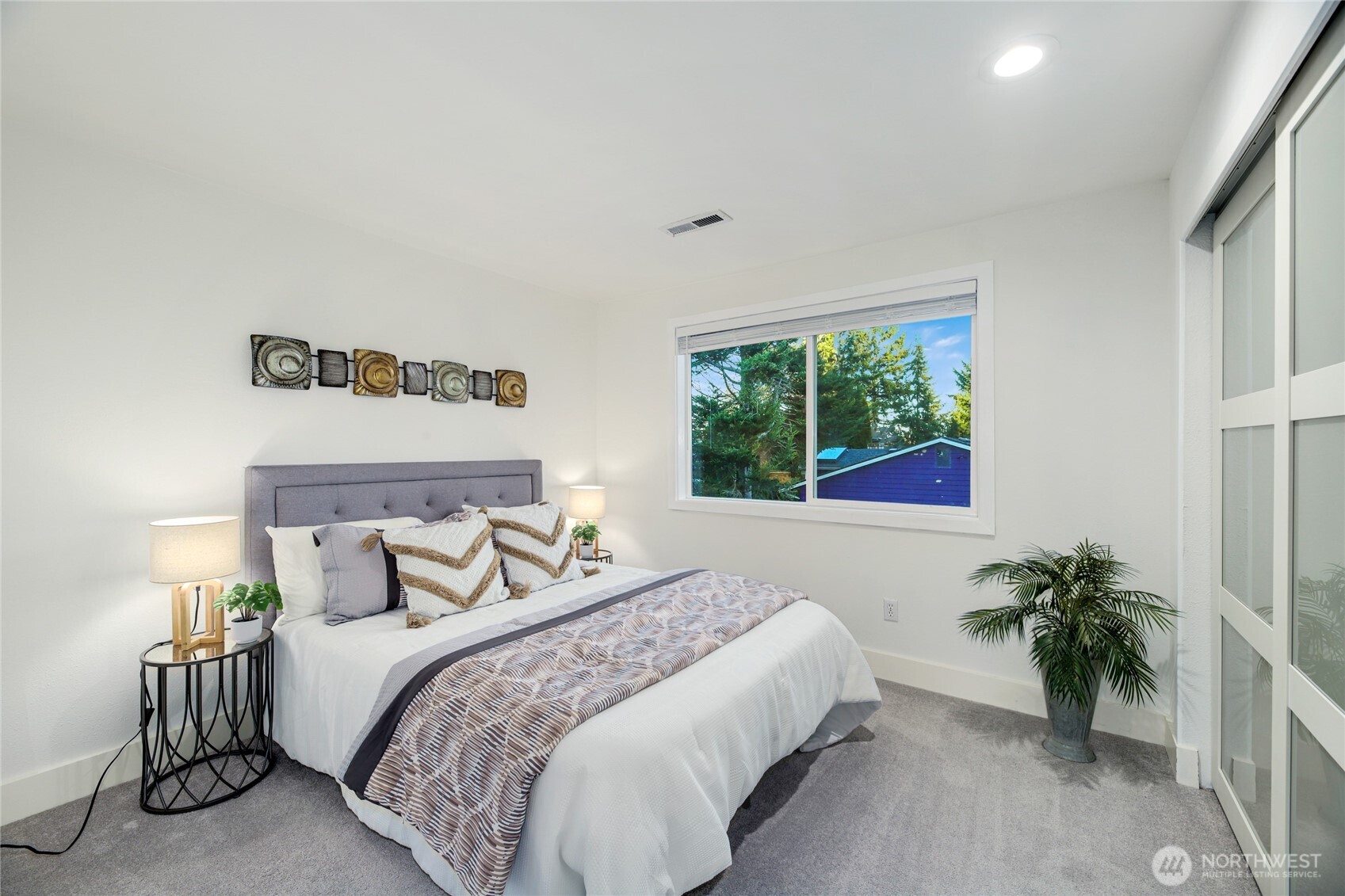 6116 152nd Avenue Northeast Redmond, WA 98052 - Photo 26 of 34 a bedroom with bed and a window