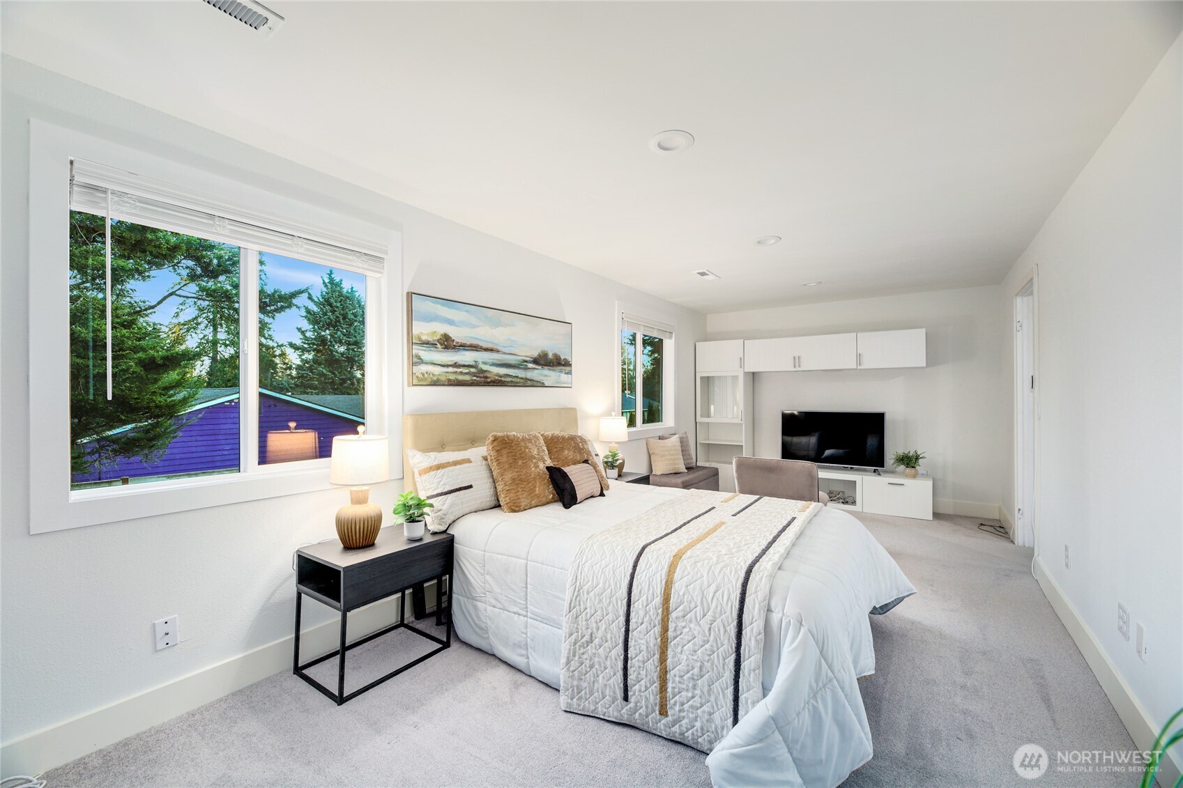 6116 152nd Avenue Northeast Redmond, WA 98052 - Photo 28 of 34 a bedroom with a bed and a window