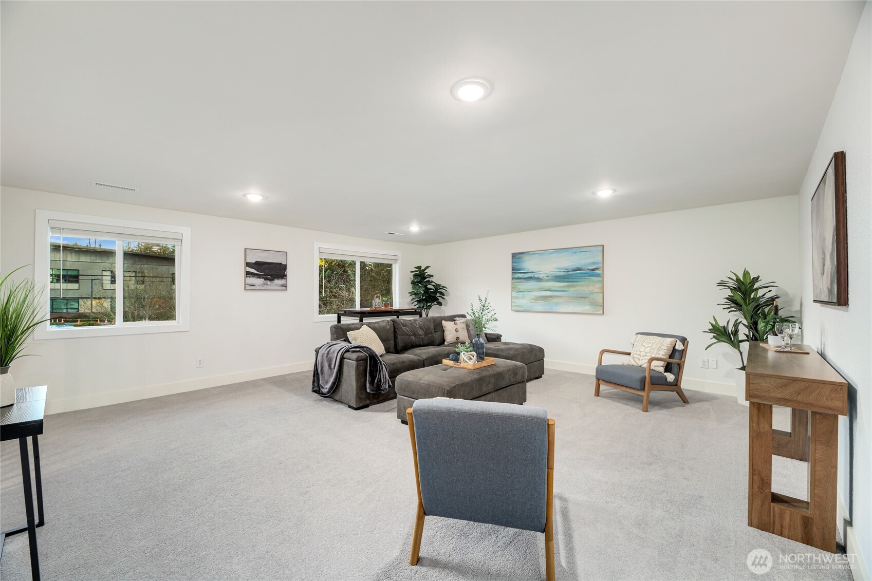 6116 152nd Avenue Northeast Redmond, WA 98052 - Photo 29 of 34 a living room with furniture and a large window