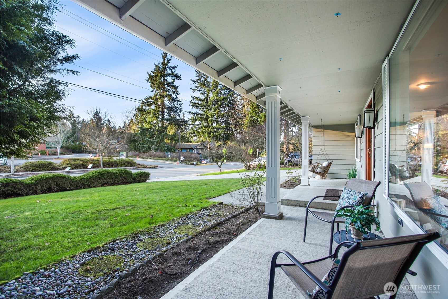 6116 152nd Avenue Northeast Redmond, WA 98052 - Photo 3 of 34 a building outdoor space with patio furniture and garden