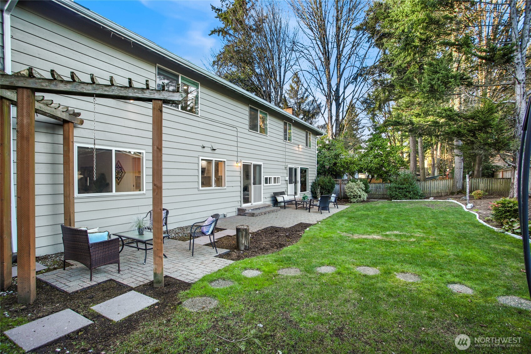 6116 152nd Avenue Northeast Redmond, WA 98052 - Photo 31 of 34 a view of a backyard with sitting area