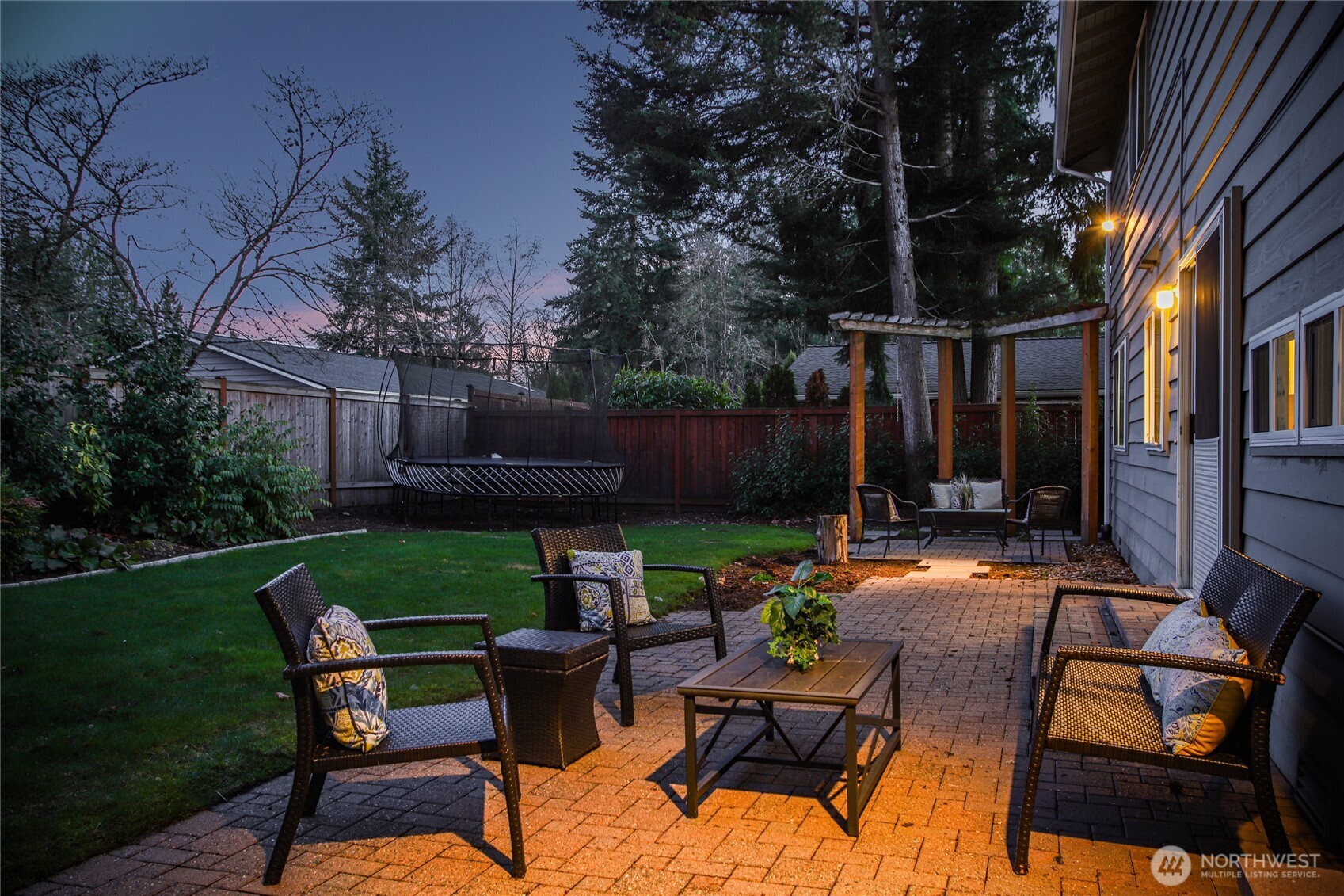 6116 152nd Avenue Northeast Redmond, WA 98052 - Photo 32 of 34 a view of a backyard with sitting area