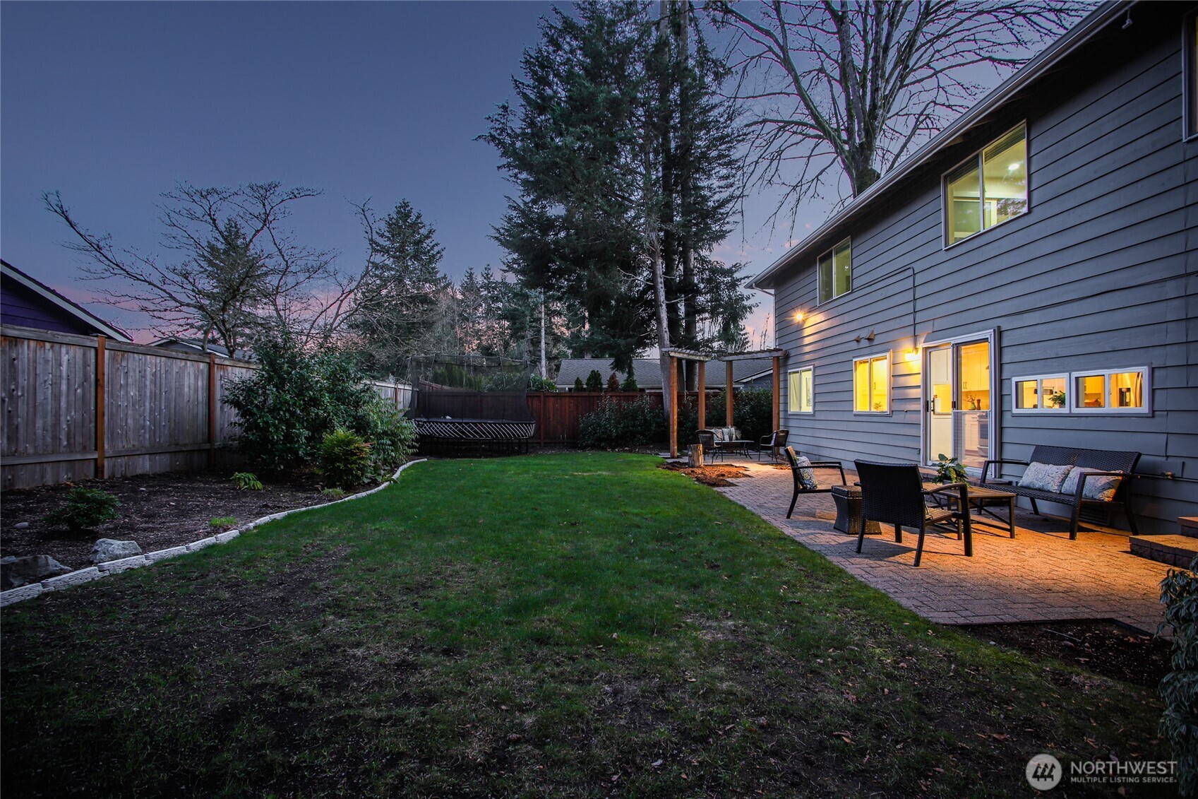 6116 152nd Avenue Northeast Redmond, WA 98052 - Photo 33 of 34 a view of a house with backyard and sitting area