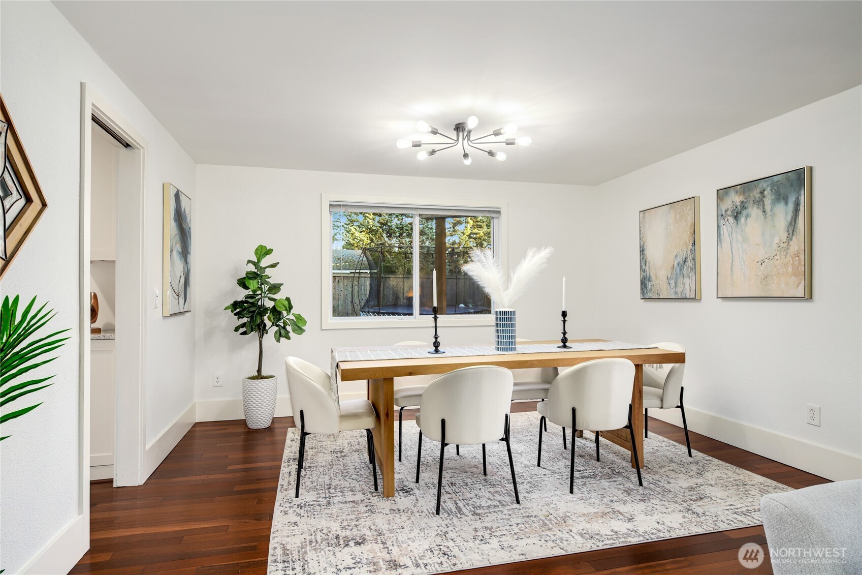 6116 152nd Avenue Northeast Redmond, WA 98052 - Photo 5 of 34 a view of a dining room with furniture window and wooden floor