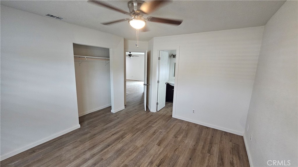 5683 Wagonwheel Road San Bernardino, CA 92407 - Photo 6 of 9 wooden floor in an empty room with a window