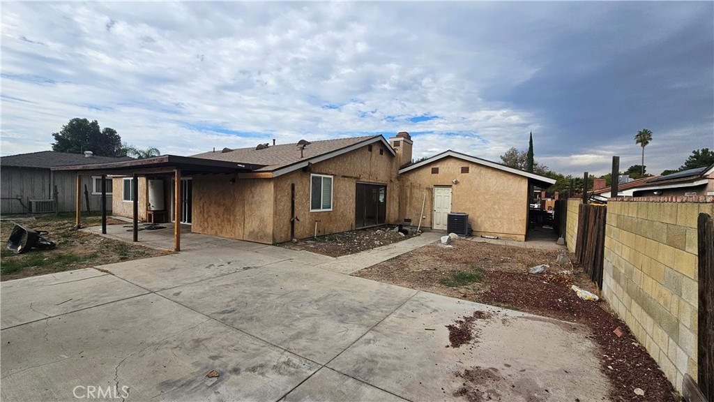 5683 Wagonwheel Road San Bernardino, CA 92407 - Photo 9 of 9 a view of a house with backyard and roof