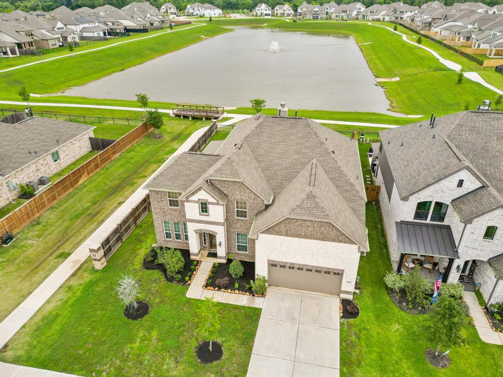 Ariel view clearly showcasing the beauty of this property. No direct rear neighbors on a corner lot.
