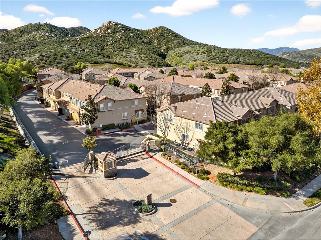 30505 Canyon Hills Road, Unit 1903 Lake Elsinore, CA 92532 - Photo 30 of 36 an aerial view of a house with a mountain