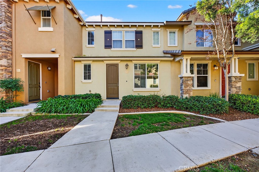 30505 Canyon Hills Road, Unit 1903 Lake Elsinore, CA 92532 - Photo 31 of 36 front view of a house with a yard