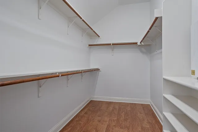 a view of an empty walk in closet