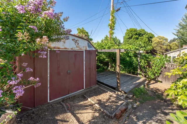 a backyard of a house with lots of green space