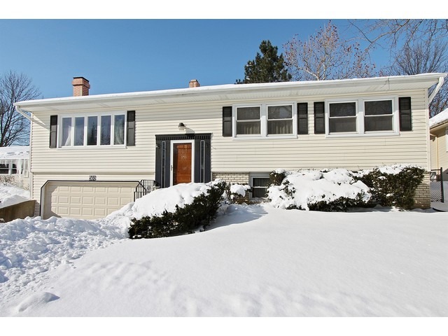 560 Weidner Road Buffalo Grove, IL 60089 - Photo 1 of 10 a front view of a house with a yard
