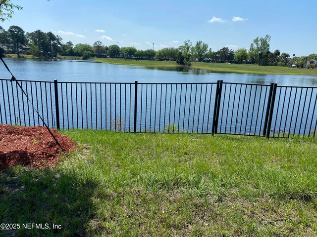 a view of a backyard with a garden