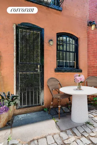 a garden view with a seating space