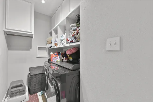 a view of storage and utility room