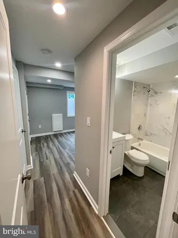 a bathroom with a sink and mirror
