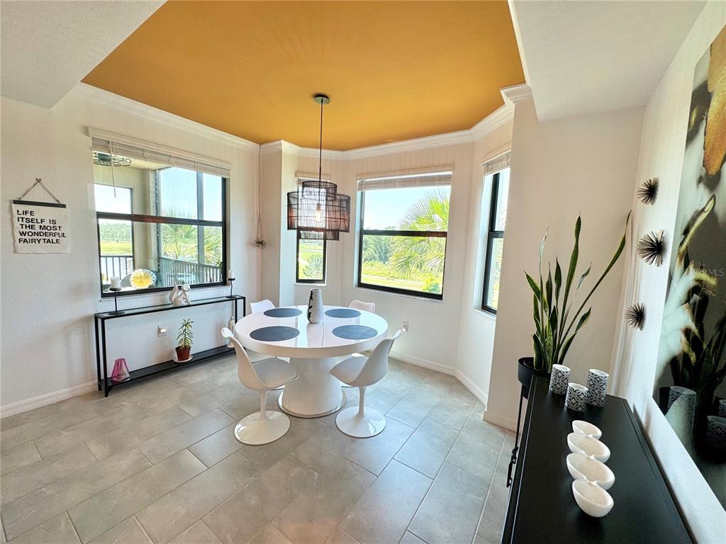 18028 Gawthrop Drive, Unit 303 Bradenton, FL 34211 - Photo 14 of 58 a bathroom with a toilet sink and mirror