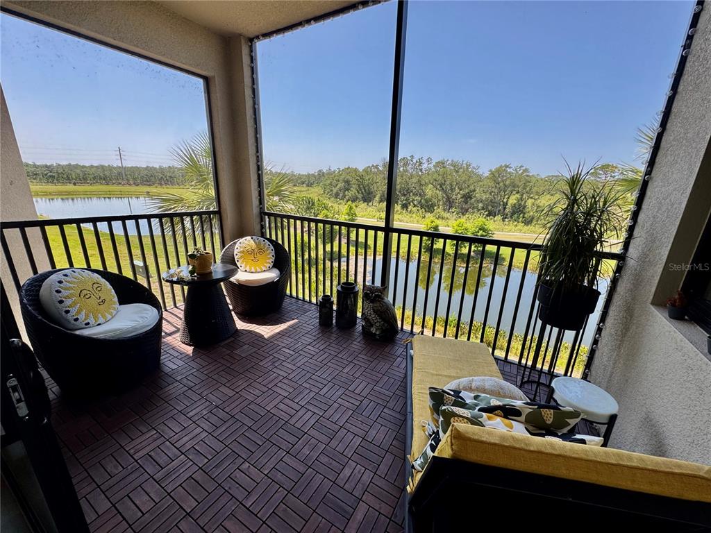 18028 Gawthrop Drive, Unit 303 Bradenton, FL 34211 - Photo 19 of 58 a view of a balcony with couch