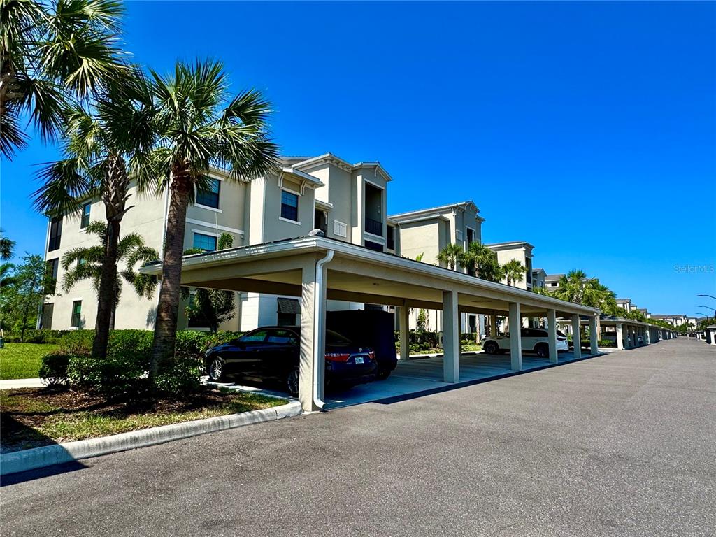 18028 Gawthrop Drive, Unit 303 Bradenton, FL 34211 - Photo 35 of 58 a view of a house with a street