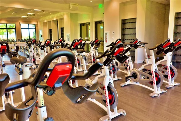 a bedroom with a large bed and a large window