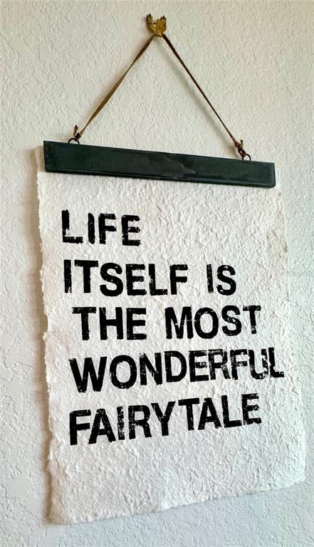 18028 Gawthrop Drive, Unit 303 Bradenton, FL 34211 - Photo 6 of 58 a black and white checkered curtain with lots of white walls