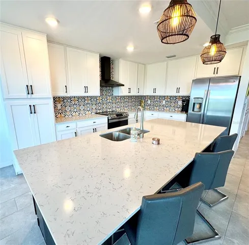 a large kitchen with a counter space