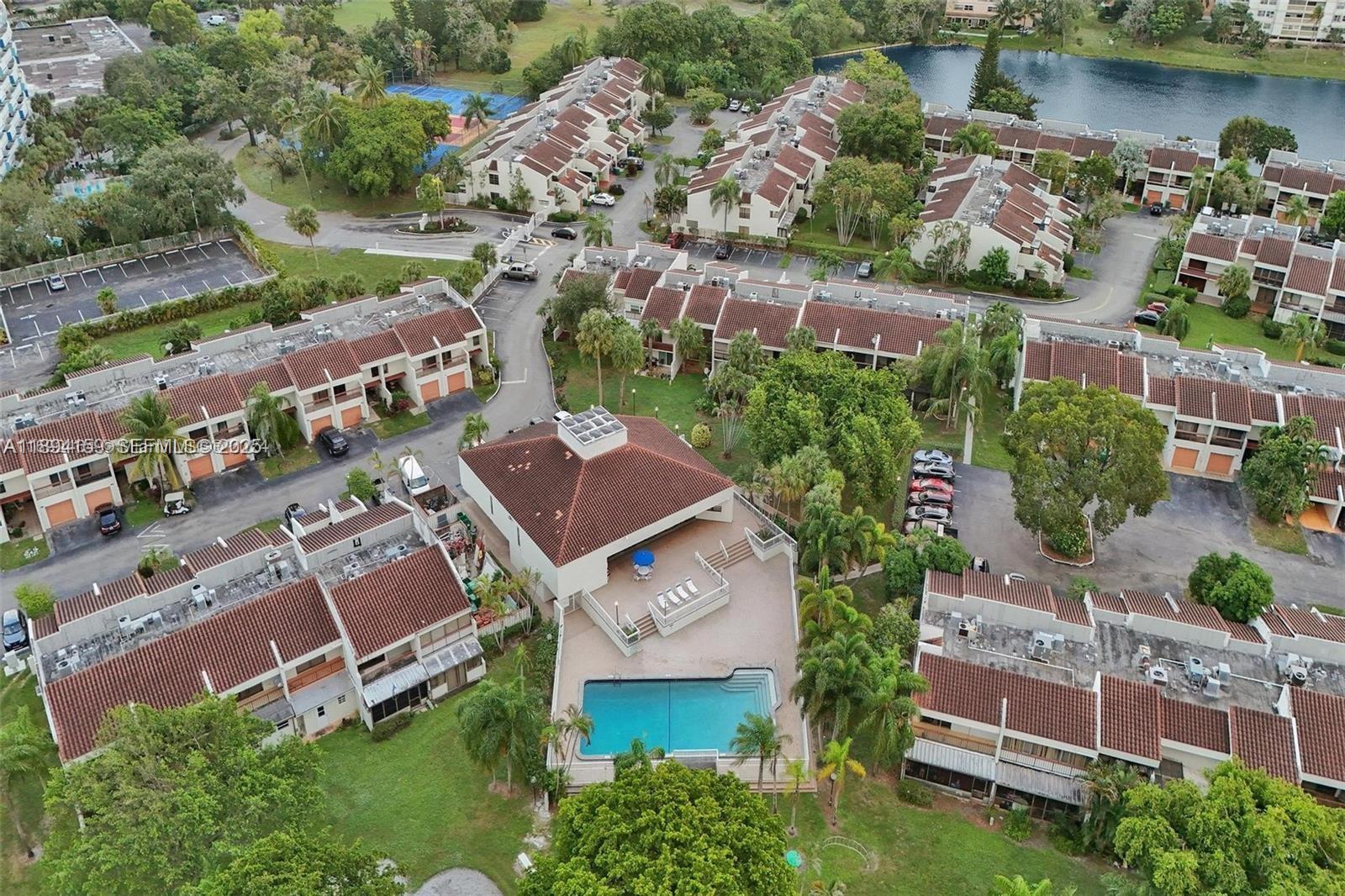 6483 Racquet Club Drive, Unit 22 Lauderhill, FL 33319 - Photo 19 of 24 an aerial view of a house with a lake view