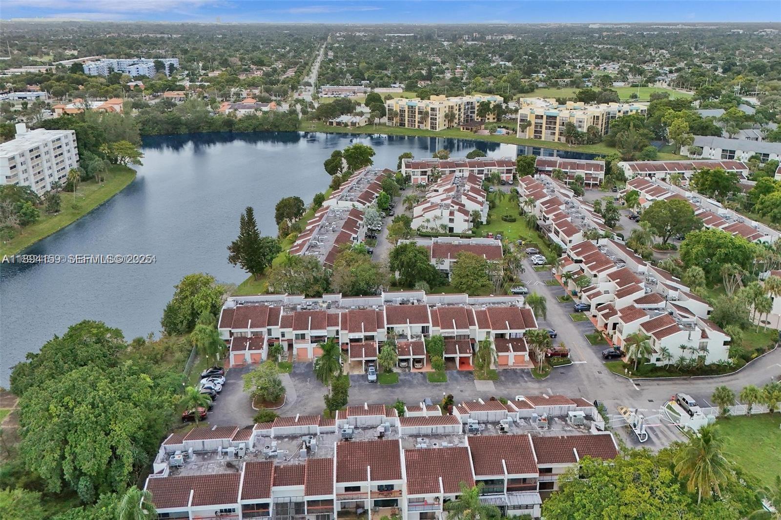 6483 Racquet Club Drive, Unit 22 Lauderhill, FL 33319 - Photo 21 of 24 an aerial view of house with yard swimming pool and outdoor space