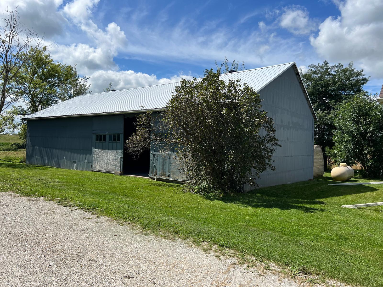 3817 68th Street Raymond, WI 53126 - Photo 10 of 55 rear house yard and pole barn