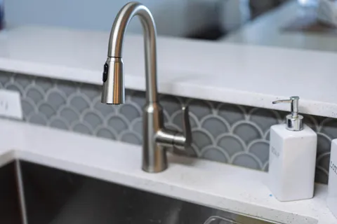 a kitchen with sink cabinets and counter top space