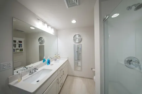 a building outdoor space with patio furniture and swimming pool