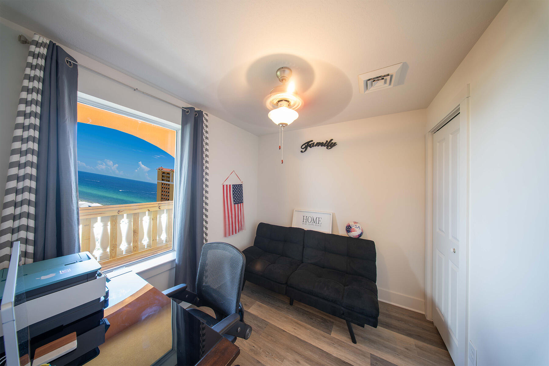 15928 Front Beach Road, Unit 32011 Panama City Beach, FL 32413 - Photo 43 of 84 a living room with furniture and a window