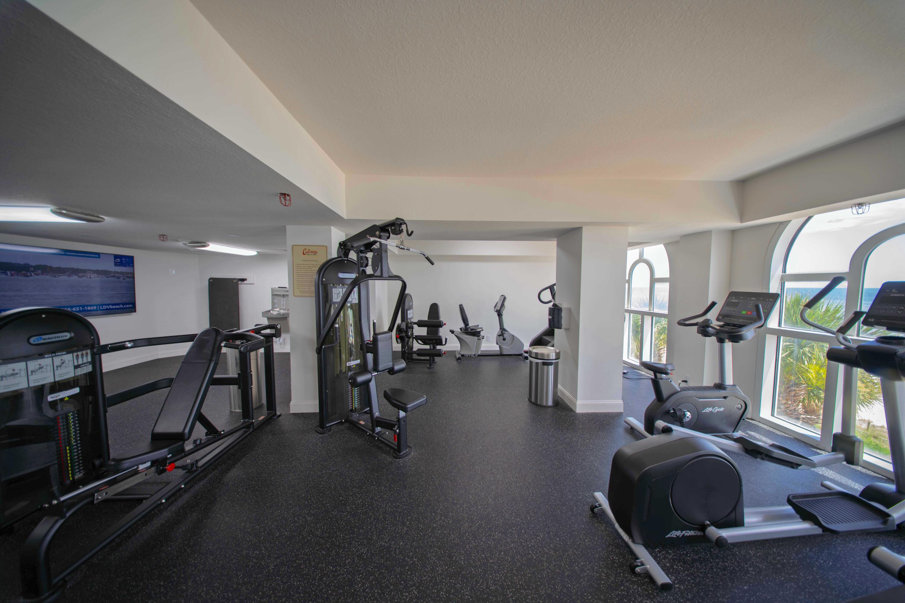 15928 Front Beach Road, Unit 32011 Panama City Beach, FL 32413 - Photo 53 of 84 a view of a room with gym equipment