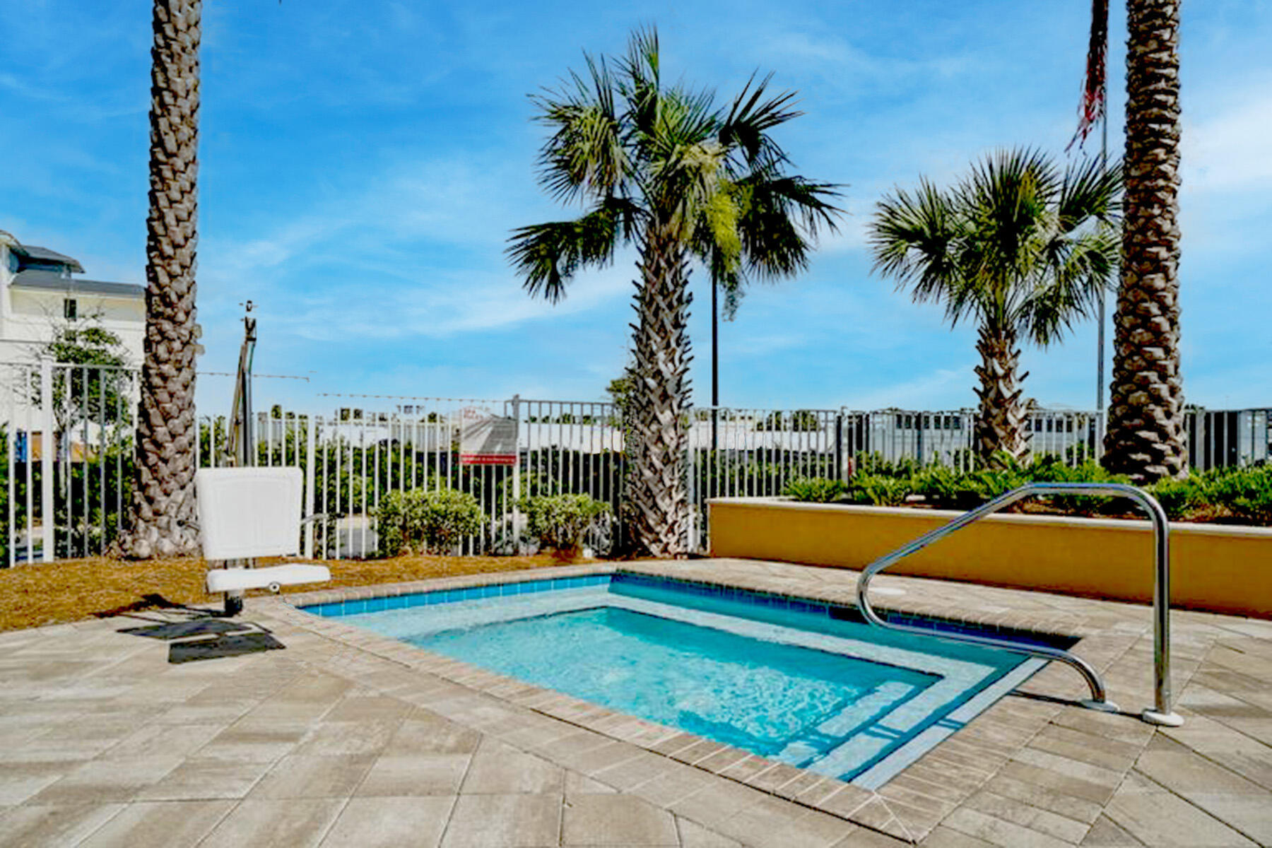 15928 Front Beach Road, Unit 32011 Panama City Beach, FL 32413 - Photo 65 of 84 a view of swimming pool with chairs