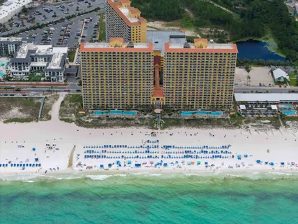 a kitchen with a sink stove and refrigerator