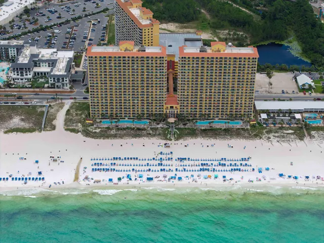 a kitchen with a sink stove and refrigerator
