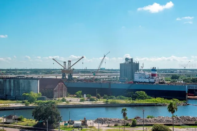 a view of a city with lawn chairs