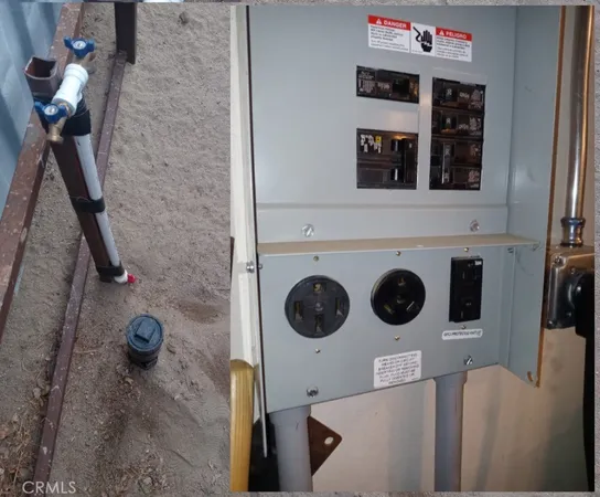 a view of a storage and utility room with washer and dryer
