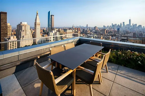 a view of a terrace with sitting area