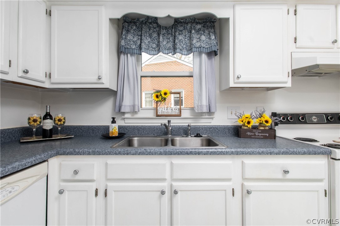 10225 Ridgerun Road Chesterfield, VA 23832 - Photo 26 of 33 a kitchen with white cabinets and a sink