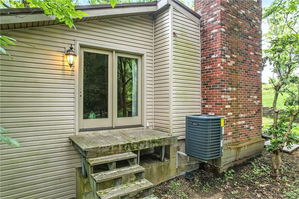 301 Hopper Road Transfer, PA 16154 - Photo 13 of 48 a view of house with backyard and outdoor seating