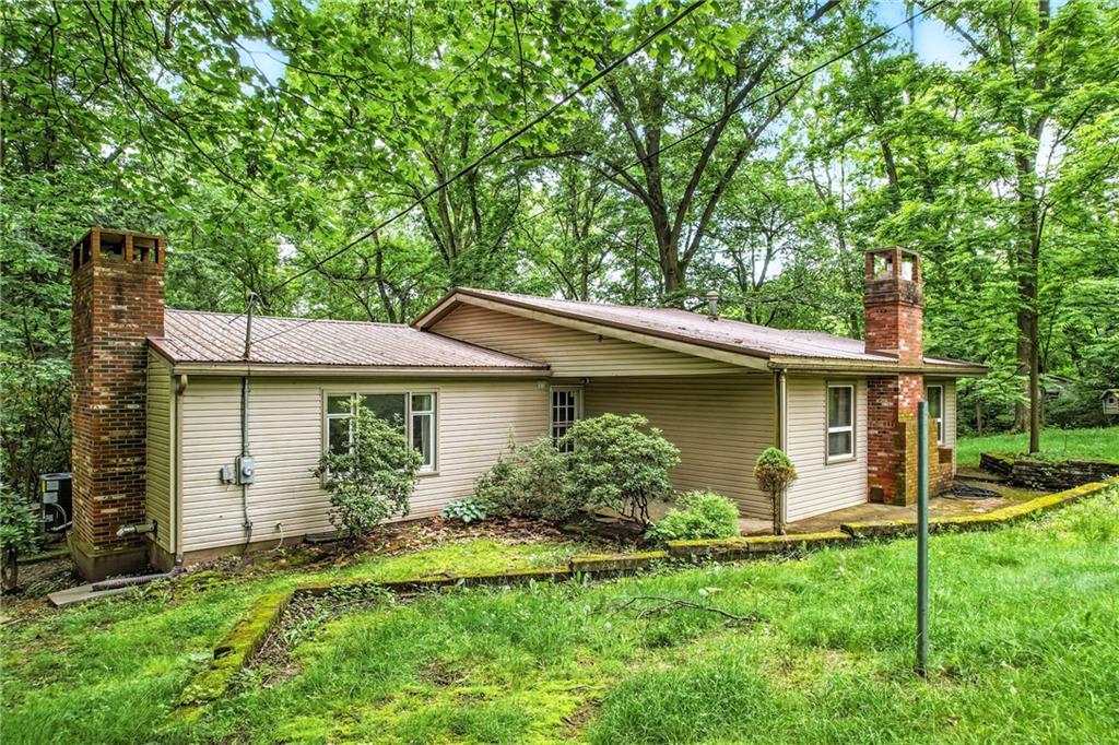 301 Hopper Road Transfer, PA 16154 - Photo 2 of 48 a view of a house with a yard