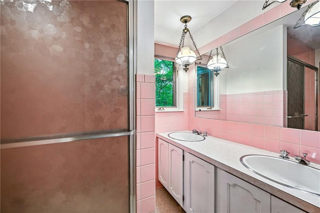 301 Hopper Road Transfer, PA 16154 - Photo 29 of 48 a bathroom with a sink and a mirror