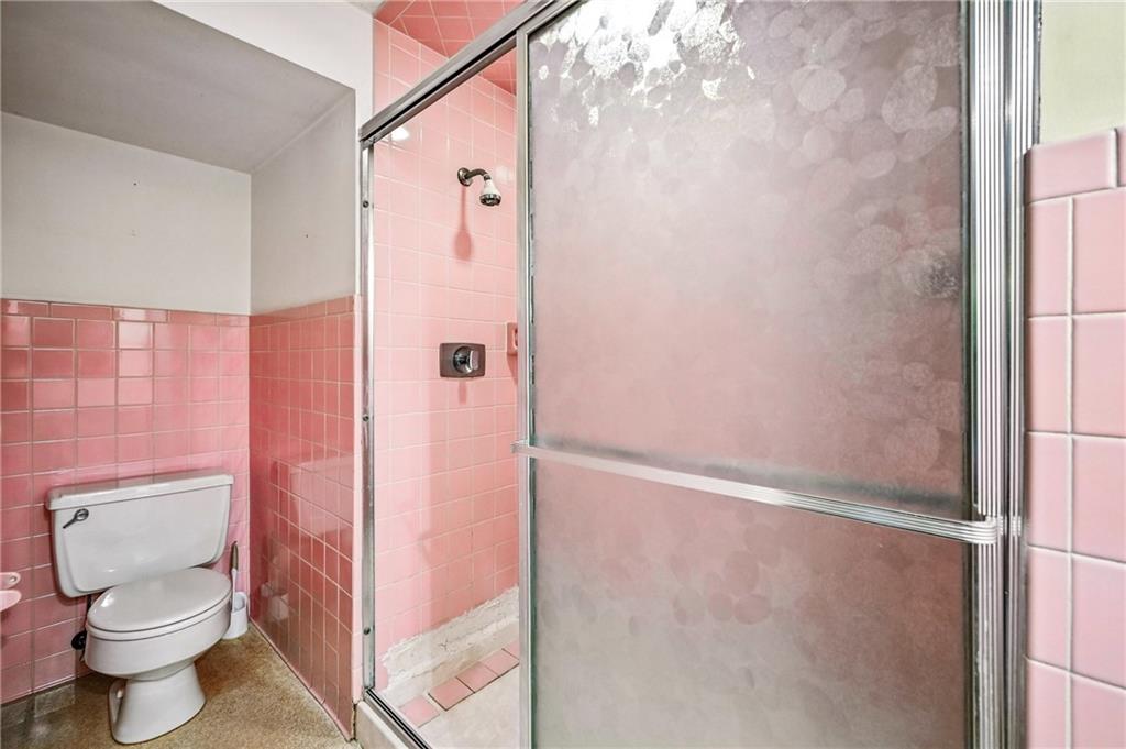 301 Hopper Road Transfer, PA 16154 - Photo 30 of 48 a bathroom with a toilet and shower